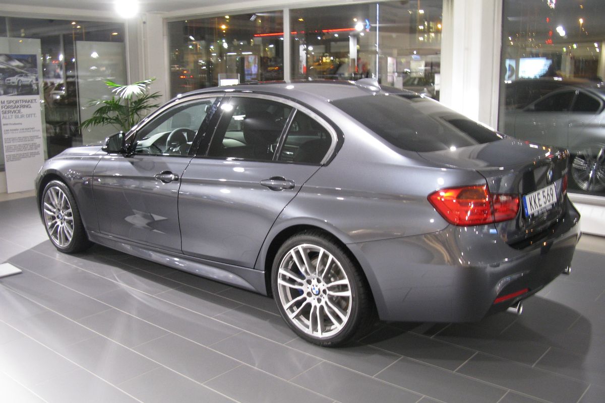 BMW F30 335i M Sport sedan photographed from the front showing M Sport front bumper and factory alloy wheels