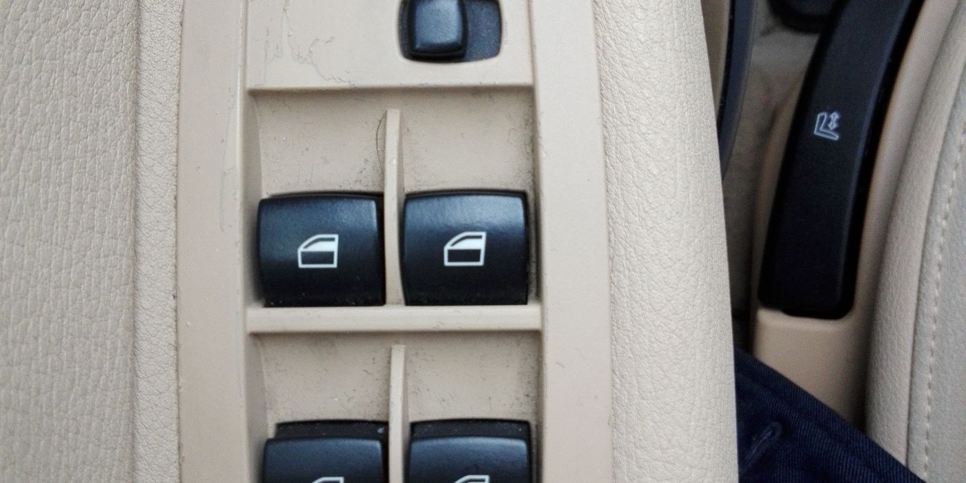 BMW interior door panel showing the speaker location in the lower door pocket