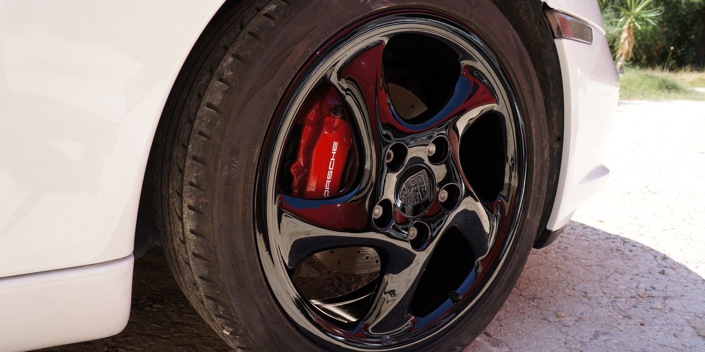 Performance two-piece floating brake rotor with aluminum center hat and iron friction ring