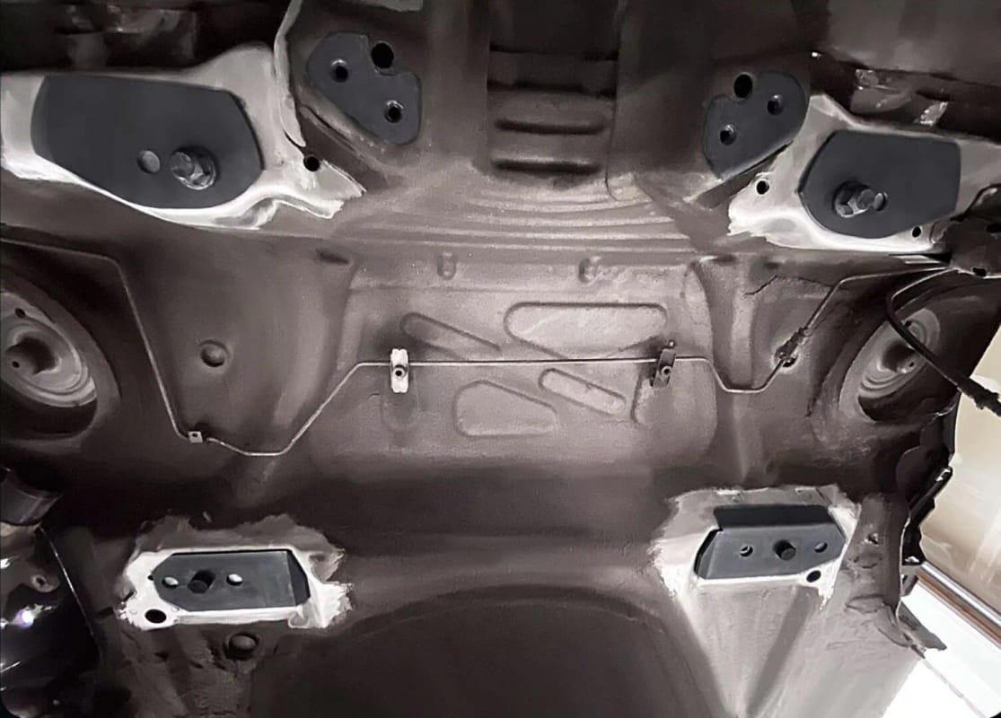 Underside of E46 showing welded subframe reinforcement plate