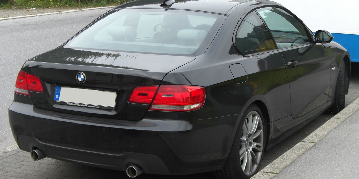 BMW E92 335 M-Paket rear bumper showing dual chrome exhaust tips under the diffuser
