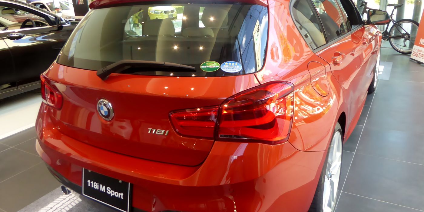 BMW 118i M Sport F20 hatchback rear view showing exhaust outlet and bumper