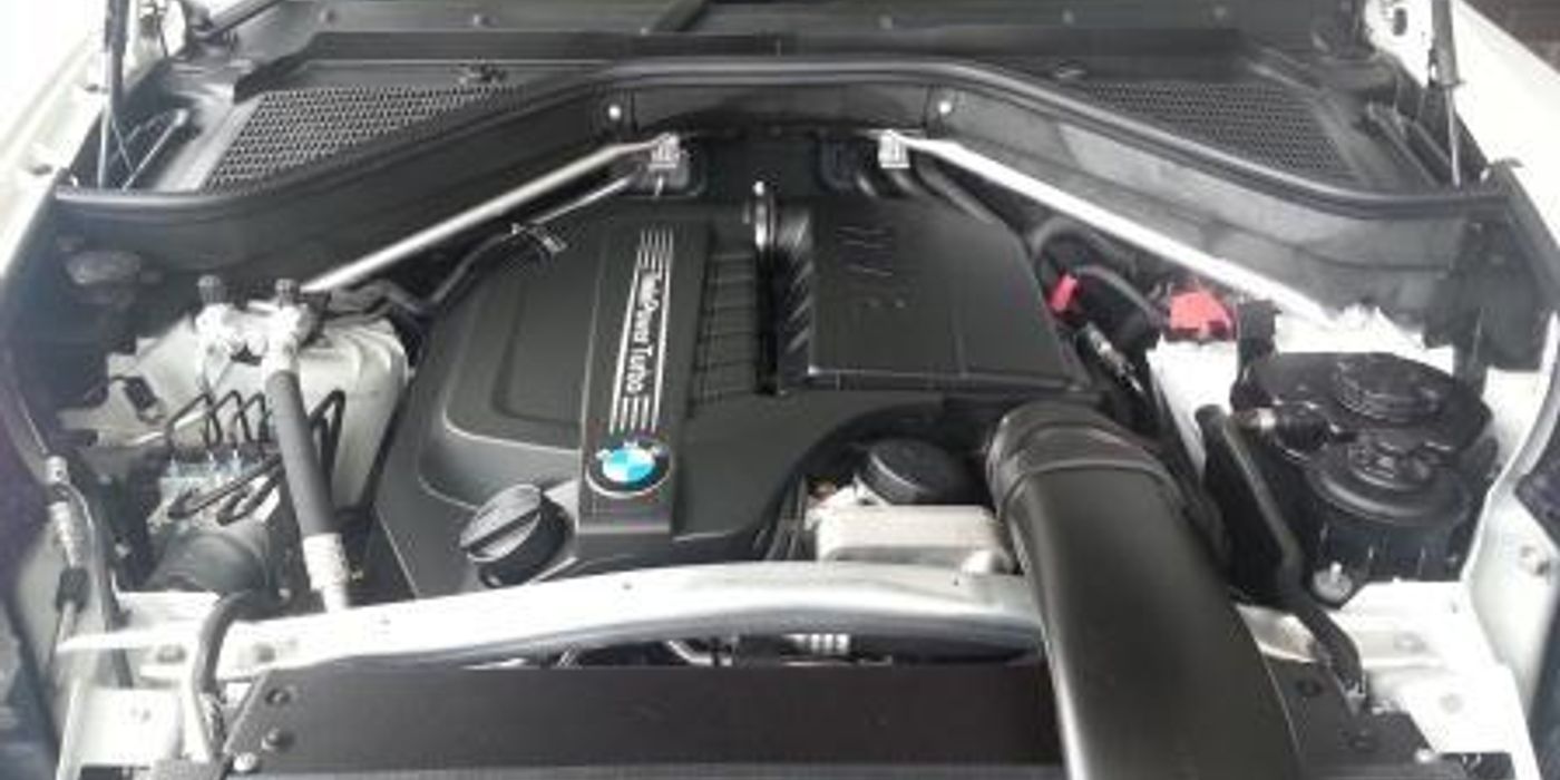 BMW N55 turbocharged inline-six engine installed in engine bay, 2013