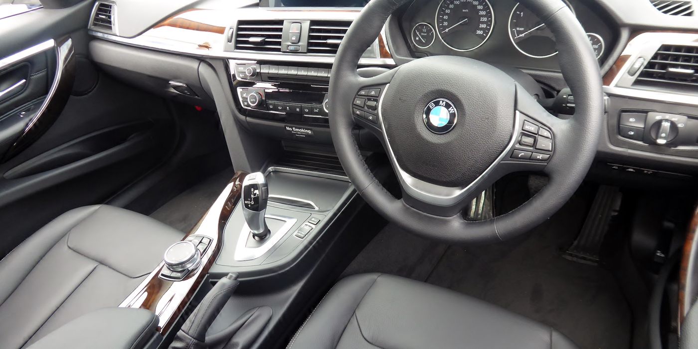 BMW F30 interior with iDrive display and steering wheel