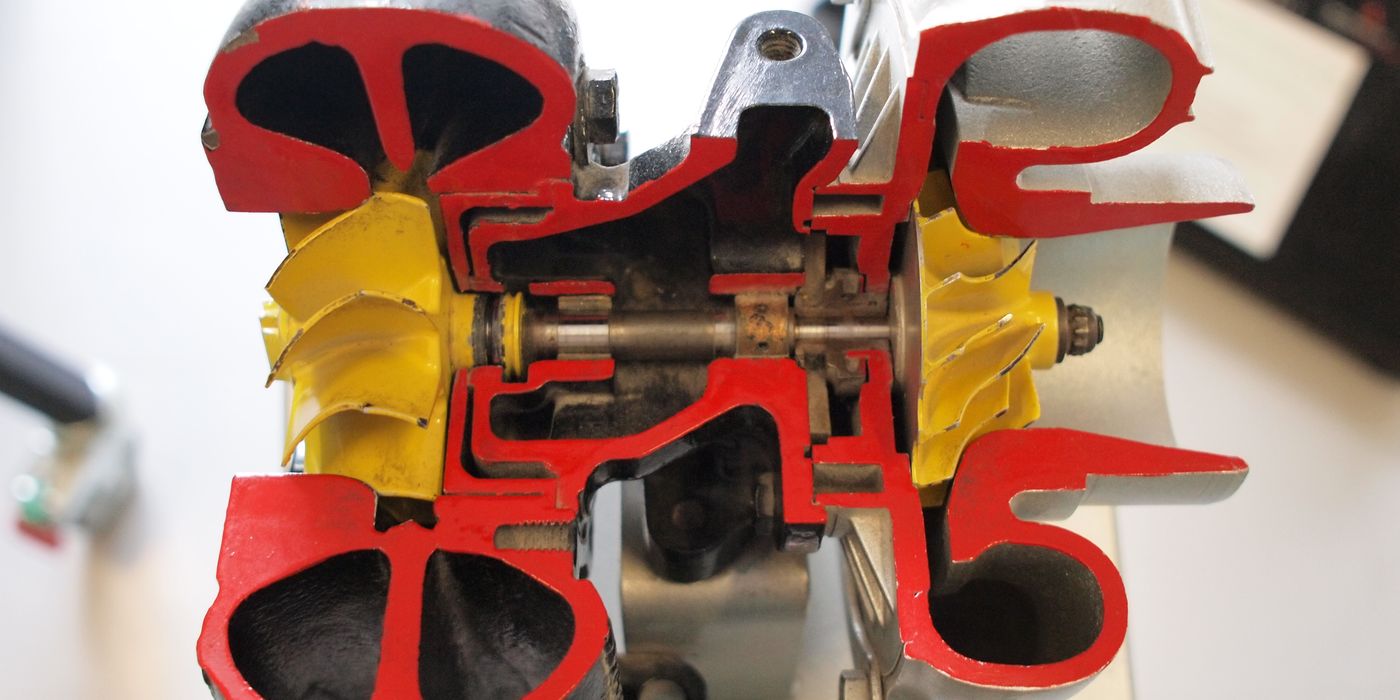 Sectioned Garrett turbocharger cutaway showing compressor and turbine wheels