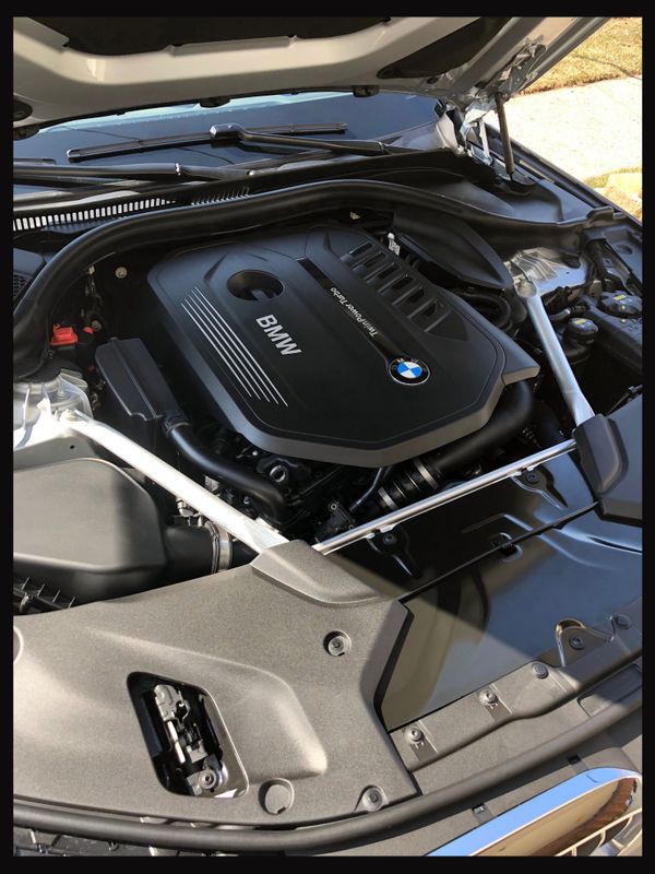 BMW B58 turbo engine on display, the stock single-turbo setup that upgraded turbos replace