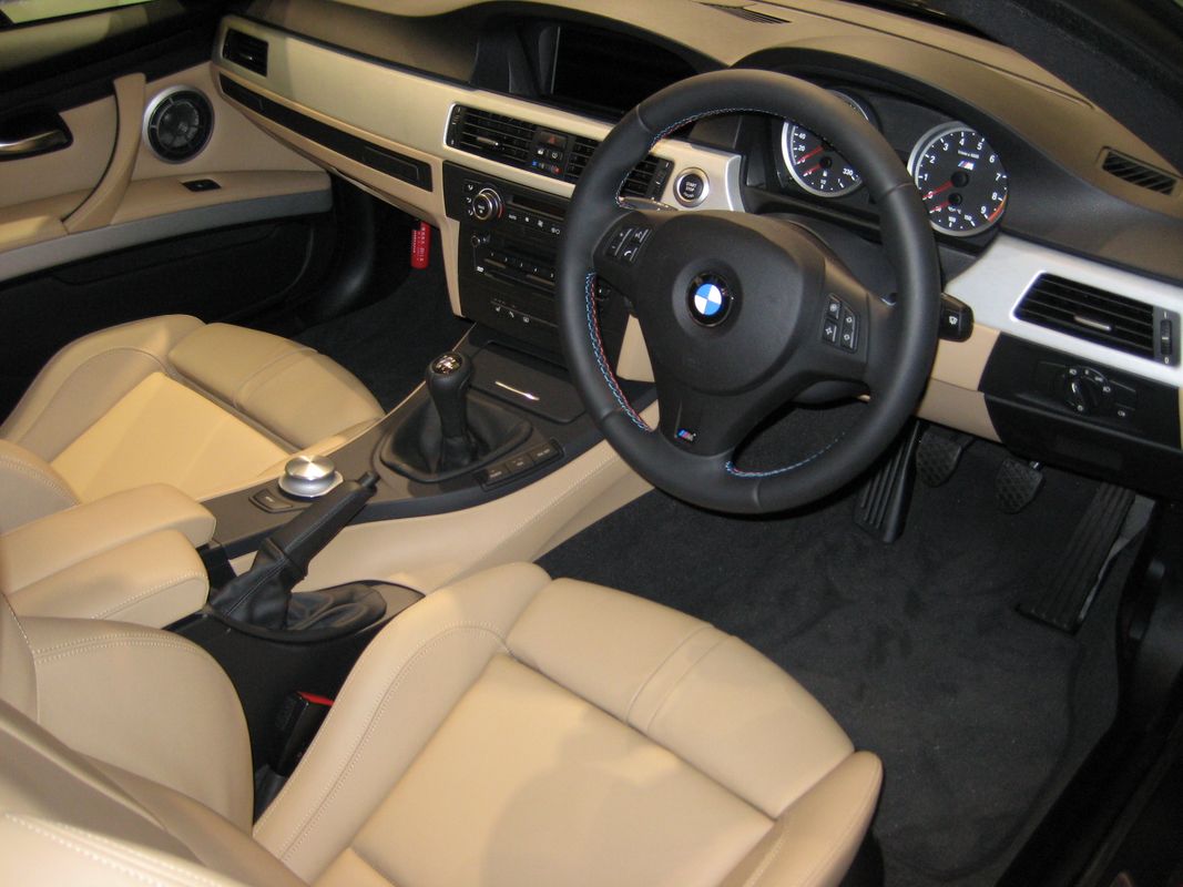 BMW E92 M3 coupe interior showing the 6-speed manual shift knob, gear lever and center console