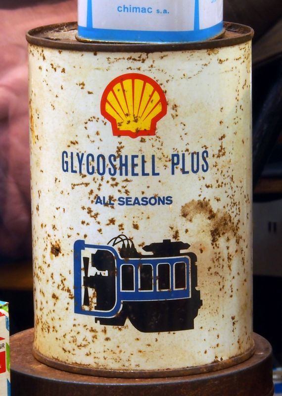 Shell Glycoshell Plus antifreeze coolant container, a yellow plastic jug used for engine cooling system refills