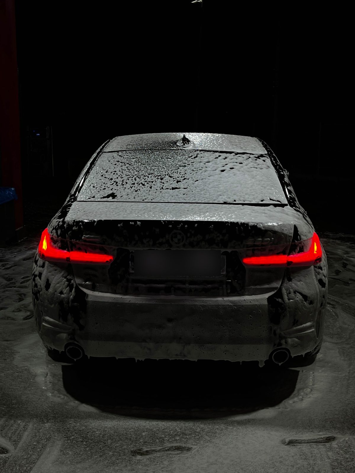 BMW G20 330i rear taillights at night